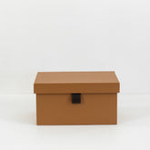 Ross storage box holding jewelry and accessories on a modern vanity or dresser